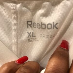 White Reebok running shorts
